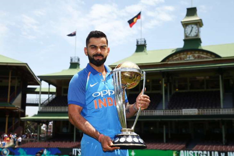 India skipper Virat Kohli poses with the ICC Cricket World Cup trophy